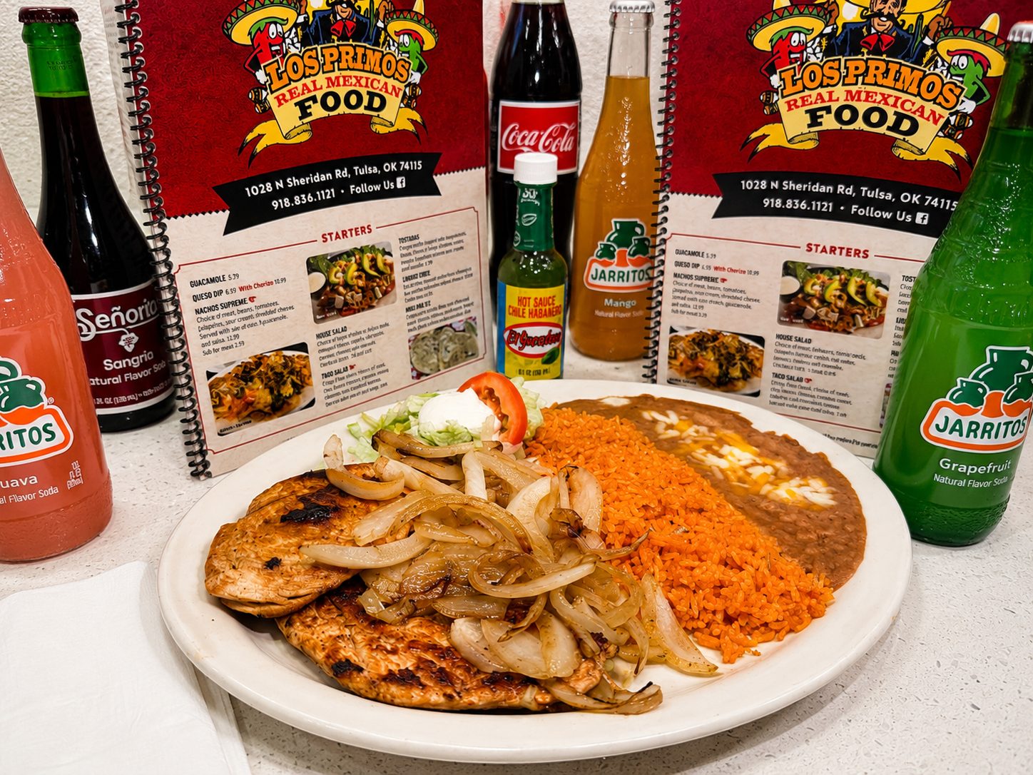 Pollo al Plancha grilled chicken with grilled onions at Los Primos